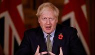 Britain's Prime Minister Boris Johnson speaks during a virtual news conference on the coronavirus disease (COVID-19) pandemic in the UK inside 10 Downing Street in central London, Britain November 9, 2020. Tolga Akmen/Pool via Reuters