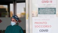 A doctor waits for patients to arrive at the Policlinico Tor Vergata hospital where patients suffering from the coronavirus disease (COVID-19) are being treated in Rome, Italy November 13, 2020. REUTERS/Guglielmo Mangiapane
