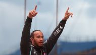 November 15, 2020 Mercedes' Lewis Hamilton celebrates after winning the race and the world championship REUTERS/Tolga Bozoglu
