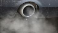 An exhaust emits fumes as a car is driven through Richmond in London, Britain December 2, 2016. REUTERS/Peter Nicholls/File Photo