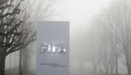 FIFA's logo is seen in front of its headquarters during a foggy autumn day in Zurich, Switzerland November 18, 2020. REUTERS/Arnd Wiegmann