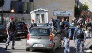 Members of the Lebanese police gather outside Baabda prison, Lebanon, November 21, 2020. REUTERS/Mohamed Azakir