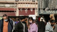 People shop at El Rastro flea market, amidst the coronavirus disease (COVID-19) outbreak in Madrid, Spain November 22, 2020. REUTERS/Javier Barbancho