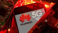 FILE PHOTO: A smartphone with the Huawei and 5G network logo is seen on a PC motherboard in this illustration picture taken January 29, 2020. REUTERS/Dado Ruvic