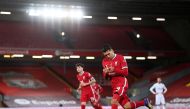 Liverpool's Roberto Firmino celebrates scoring their third goal Pool via REUTERS/Laurence Griffiths 