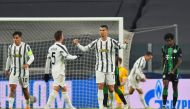 Soccer Football - Champions League - Group G - Juventus v Ferencvaros - Allianz Stadium, Turin, Italy - November 24, 2020 Juventus' Cristiano Ronaldo celebrates scoring their first goal with Arthur REUTERS/Massimo Pinca
