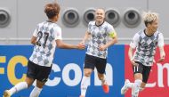 Kobe’s forward Kyogo Furuhashi (right) celebrates his goal during the AFC Champions League group G match against China’s Guangzhou Evergrande at the Khalifa International Stadium, yesterday.