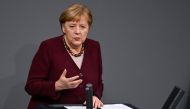 German Chancellor Angela Merkel delivers a speech during a session at the Bundestag (lower house of parliament) on November 26, 2020 in Berlin on measures to curb the spread of the novel coronavirus (COVID-19). / AFP / Tobias SCHWARZ