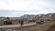 Security personnel are seen after a suicide car bomber struck an army base on the outskirts of Ghazni province on November 29, 2020. AFP / STR