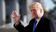 U.S. President Donald Trump waves as he walks on the South Lawn of the White House upon his return to Washington from Camp David, U.S., November 29, 2020. REUTERS/Yuri Gripas

