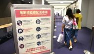 FILE PHOTO: Notes about quarantine measures can be seen at Songshan Airport, during the global outbreak of the coronavirus disease (COVID-19), in Taipei, Taiwan November 19, 2020. REUTERS/Ann Wang