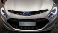 The Hyundai Sonata hybrid is displayed during the first media preview day at the 2011 Chicago Auto Show in Chicago, Illinois February 9, 2011. REUTERS/Frank Polich/File Photo