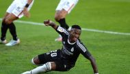 Real Madrid's Brazilian forward Vinicius Junior celebrates after scoring a goal during the Spanish League football match between Sevilla and Real Madrid at the Sanchez Pizjuan stadium in Seville on December 5, 2020. / AFP / CRISTINA QUICLER