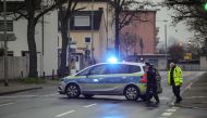 Police closes a street as people leave their home area in the Gallus district in Frankfurt am Main, western Germany, during an evacuation on early morning of December 6, 2020. AFP / Armando BABANI