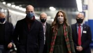 Britain's Prince William and Catherine, Duchess of Cambridge, board the Royal train at London Euston Station, as they embark on a three-day tour aboard the Royal train to thank frontline staff and community workers in the UK, in London, Britain, December 