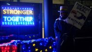 Anti-Brexit activist Steve Bray stands with a placard as he protests outside a conference centre in central London on December 4, 2020, as talks continue on a trade deal between the EU and the UK. / AFP / Niklas HALLE'N
