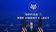 US President-elect Joe Biden, with Vice President-elect Kamala Harris (L), announces his economic team at The Queen Theater in Wilmington, Delaware, on December 1, 2020. / AFP / CHANDAN KHANNA
