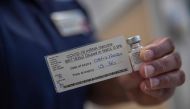 A nurse holds a phial of the Pfizer-BioNTech Covid-19 vaccine at the Royal Free hospital in London on December 8, 2020 at the start of the UK's biggest ever vaccination programme.   AFP / POOL / Jack Hill