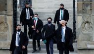 Canada's Prime Minister Justin Trudeau walks to a news conference, as efforts continue to help slow the spread of the coronavirus disease (COVID-19), in Ottawa, Ontario, Canada December 7, 2020. REUTERS/Blair Gable
