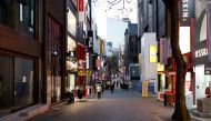 A previously crowded shopping street affected by heightened social distancing rules is pictured amid the coronavirus disease (COVID-19) pandemic in Seoul, South Korea, December 8, 2020. REUTERS/Kim Hong-Ji