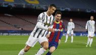 December 8, 2020 FC Barcelona's Lionel Messi in action with Juventus' Cristiano Ronaldo REUTERS/Albert Gea