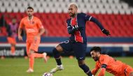 Paris Saint-Germain's Brazilian forward Neymar (L) is challenged by Istanbul Basaksehir's Turkish midfielder Mahmut Tekdemir during the UEFA Champions League group H football match between Paris Saint-Germain (PSG) and Istanbul Basaksehir FK at the Parc d