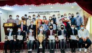 Winners and organisers of the TraQuest Quiz Competition pose for a photo during the award ceremony at the Integrated Indian Community Centre.