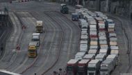 FILE PHOTO: Freight and goods lorries queue at the entrance of the port of Dover on the south coast of England. March 19, 2018. AFP / Daniel LEAL-OLIVAS