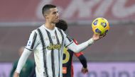 Juventus' Cristiano Ronaldo holding the ball after the match REUTERS/Jennifer Lorenzini