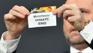 Portuguese football player Nuno Ricardo de Oliveira Ribeiro aka Maniche revealing the slip of Manchester United during the draw for the round of 32 of the UEFA Europa League. AFP