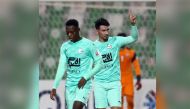 Al Ahli's Hernan Perez (right) celebrates his goal against Al Kharaitiyat, yesterday.  