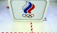 A picture shows the logo of the Russian Olympic Committee (ROC) inside its headquarters in Moscow on December 17, 2020. (AFP / Kirill KUDRYAVTSEV)