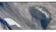 A satellite image of the A-68A iceberg (L) as it approaches South Georgia island (R) in the South Atlantic, December 4, 2020. Picture taken December 4, 2020. Copernicus Sentinel-Pierre Markuse/Handout via REUTERS/File Photo