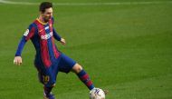 Barcelona's Argentinian forward Lionel Messi controls the ball during the Spanish league football match between FC Barcelona and Valencia CF at the Camp Nou stadium in Barcelona on December 19, 2020. (AFP / LLUIS GENE)