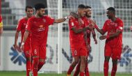 Al Duhail players celebrate after yesterday's big win.