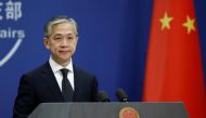 Chinese Foreign Ministry spokesman Wang Wenbin attends a news conference in Beijing, China November 9, 2020. REUTERS/Tingshu Wang/File photo
