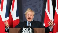 Britain's Prime Minister Boris Johnson gestures as he holds a remote press conference to update the nation on the post-Brexit trade agreement, inside 10 Downing Street in central London on December 24, 2020. (AFP / Paul Grover)