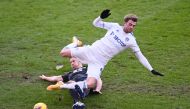 Burnley's Ben Mee in action with Leeds United's Patrick Bamford (REUTERS/Laurence Griffiths)