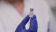 A nurse holds a vial of the Pfizer-BioNTech coronavirus disease (COVID-19) vaccine at Attikon hospital, in Athens, Greece, December 27, 2020. Kostas Tsironis/Pool via REUTERS
