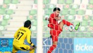 Al Duhail's Ahmed Yasser scores his team's second goal against Al Ahli during yesterday's match.