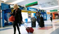 Passengers arrive on a flight from London amid new restrictions to prevent the spread of coronavirus disease (COVID-19) at JFK International Airport in New York City, U.S., December 21, 2020. REUTERS/Eduardo Munoz/File Photo