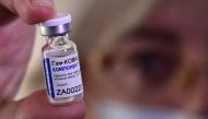 FILE PHOTO: In this file photo taken on December 14, 2020, a medical worker shows a vial with Sputnik V (Gam-COVID-Vac) vaccine against the coronavirus disease during the vaccination of medics at a clinic in the far eastern city of Vladivostok.  AFP / Pav