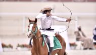 Qatari archer Badr Mubarak Al Marri in action during the first horseback shooting competition (Al Nashaab Championship) organised by the Qatar Equestrian Federation and Modern Pentathlon. The event was organised in cooperation with the Horseback Archery S