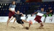 Action during the semi-finals of the beach football tournament of the Qatar Olympic Committee Beach Games at Aspire Zone yesterday.