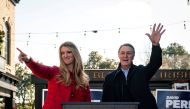 FILE PHOTO: Senator Kelly Loeffler (R-GA) and Senator David Perdue (R-GA), wave during a campaign event at the Olde Blind Dog Irish Pub, in Milton, Georgia, U.S., December 21, 2020.REUTERS/Al Drago/File Photo
