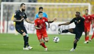 Al Duhail's Eduardo Rodriguez vying for the ball with Umm Salal players during their QNB Stars League Round 12 match played at Qatar SC Stadium, yesterday. 