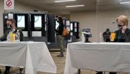 A voter casts her ballot in Georgia’s Senate runoff elections on an electronic voting machine at a Fulton County polling station in Sandy Springs, Georgia, U.S. January 5, 2021. REUTERS/Elijah Nouvelage
