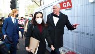 Stella Morris, partner of WikiLeaks founder Julian Assange, Editor in Chief of WikiLeaks Kristinn Hrafnsson and WikiLeaks Ambassador Joseph Farrell leave after a court denied bail to WikiLeaks founder Julian Assange, outside the Westminster Magistrates Co