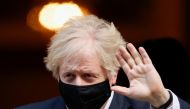 Britain's Prime Minister Boris Johnson waves as he leaves Downing Street, in London, Britain, January 6, 2021. REUTERS/John Sibley