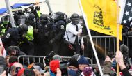 Supporters of U.S. President Donald Trump clash with police officers outside of the U.S. Capitol Building in Washington, U.S. January 6, 2021. REUTERS/Stephanie Keith
